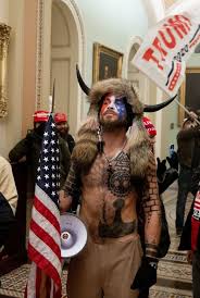 Trump supporter in horns and fur is charged in capitol riot. Shirtless Horned Capitol Rioter And Qanon Enthusiast Has Been Arrested Huffpost