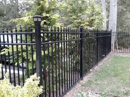 When installing a wooden fence gate you should: Ornamental Aluminum Fence With Solar Lights Installed In Syosset Ny By Liberty Fence Railing Aluminum Fence Fence Design Fence Solar Lights
