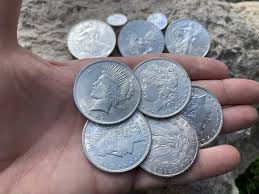 27 grams (original) or 26.7 grams (restrike) 39mm. Morgan And Peace Dollars Vs Silver Bullion Phoenix Gold Corp