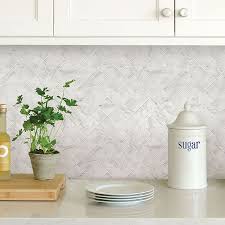 Royal herringbone random sized marble mosaic tile. Nh2358 Herringbone Carrara Marble Peel And Stick Backsplash Tiles By In Home