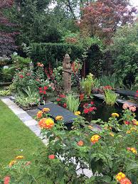 Border garden sidewalk | rock garden with small fountain. Landscape Borders Eye Catching Ideas To Separate Your Garden Areas