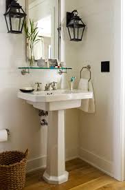 cottage powder room with carriage