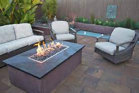 Fire glass, ceramic balls and other decorative if you like the look of these angular lava rocks alone, theyre an affordable way to fill a fireplace. How To Build A Gas Fire Pit Hgtv