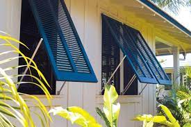 If you have ever wondered which shutter styles are the best for beach homes, you'll find that there are some popular beach house styles that bermuda shutters are installed on include cottages, ranch homes, cape cods and bungalows. Tropical Beach Homes Shutters Garage Door Gallery Timberlane