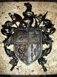 Maybe you would like to learn more about one of these? Coat Of Arms Wall Plaque Medieval Shield Knight Helmet Etsy In 2021 Medieval Decor Medieval Shields Coat Of Arms