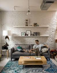 Check these 19 stunning brick wall designs in home decor. Create An Elegant Statement With A White Brick Wall Design Ideas Brick Living Room Brick Wall Living Room Brick Interior Wall
