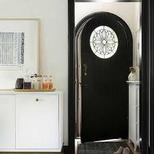 However, if you have certain sensitivities or concerns with the amount of light that comes into your home, it may be a smart idea to purchase a door with a smaller glass pane and a. Black Door With Stained Glass Design Ideas