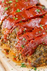 Meatloaf stuffed with feta cheese and topped with a sweet and tangy glaze. The Best Meatloaf Recipe Spend With Pennies