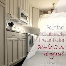Painted Kitchen Cabinets One Year Later Repainting Kitchen Cabinets Painting Kitchen Cabinets Oak Kitchen Cabinets