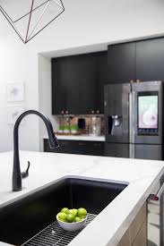 Black And White Quartz Kitchen Matte Black Is A Major Feature Of The Cast Shadows Kitchen Black Kitchen Sink White Kitchen Design Best Kitchen Sinks