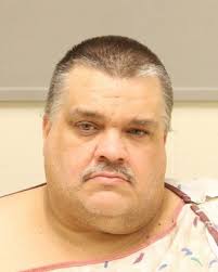 625-pound man arrested while driving, pleads guilty to making bomb threat