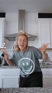 Dance Moves in a Stylish Kitchen Setting