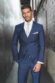Keep your perfect suit for the big day, and beyond. How To Wear Blue Suits For Every Occasion The Trend Spotter Blue Suit Wedding Groomsmen Suits Men Suits Blue
