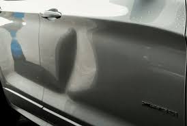 Your auto insurance policy covers door dings as long as you have collision, and coverage is subject to your deductible. Dent Vs Ding Auto Body Repair Leahy S Auto