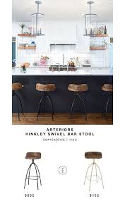 Each of these bar stools has grey/brown metal legs, a full metal seatback, and a clean tan cushion. Arteriors Hinkley Swivel Bar Stool Copy Cat Chic With Images Kitchen Bar Stools Stools For Kitchen Island Bar Stools Kitchen Island