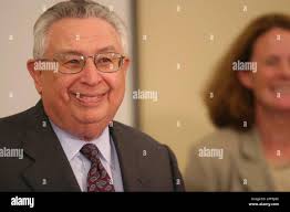 Fletcher Allen Health Care Interim President and CEO Ed Colodny, left, and  Louise McCarren, chair of the Fletcher Allen Health Care Board of Trustees,  right, smile as Colodny is asked a question