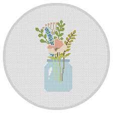One of them is by repeating the element found in a detailed cross stitch pattern and placing these elements throughout. Flowers Cross Stitch Pattern Flower Arrangement Modern Cross Etsy Cross Stitch Patterns Flowers Floral Cross Stitch Cross Stitch Designs