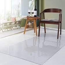 This carpet protector is a heavy duty clear vinyl mat with firm gripper points underneath that securely grab the carpet to resist buckling under heavy foot traffic. 1 Metre Long 27 Width Bargains Hut Heavy Duty Clear Vinyl Carpet Floor Protector Plastic Floor Mat Non Sip Waterproof Chair Mat Office Home Hallway Runner 27 Wide Carpets Rugs Runners
