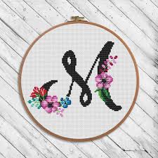 Check spelling or type a new query. Letter M Of Black Floral Cross Stitch Monogram Botanical Etsy Floral Cross Stitch Cross Stitch Letters Monogram Cross Stitch