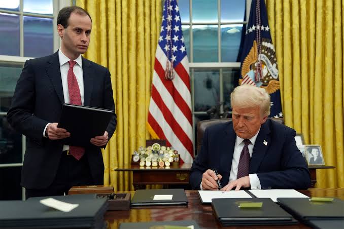 Who's the guy handing Trump those binders of executive orders? Meet Will  Scharf | KBIA