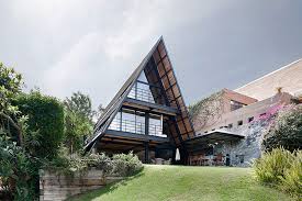 Guests at the holiday home can enjoy hiking and fishing nearby, or make the most of the garden. Secluded Modern Lake House In Mexico Photos Ideas Design