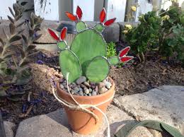 Cacti make wonderful houseplants and can thrive even if neglected on occasion. 28 Glass Cactus Ideas Glass Cactus Stained Glass Flowers Stained Glass Projects