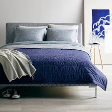 Gray and navy bedroom decor inspiration, with hints of gold and seafoam green. L E Solid Navy Gray Reversible Quilt Unison