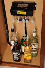 Custom, handmade liquor bottle dispenser. Sidebar Pump Systems And Supply Bottles In The Wet Bar Cabinet Liquor Dispenser Alcohol Dispenser Drink Dispenser