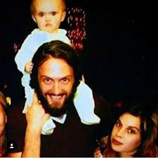 Zef Family Baby Sixteen Jones On The Shoulders Of Father Watkin Tudor Jones Ninja With Mother Anri Du Toit Yolandi Visser On The Right Side