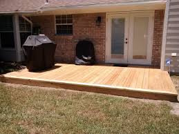 Commonly made of a flexible pvc plastic material, these patio tiles add comfort to patio flooring over concrete with unmatched drainage capabilities. To Over Wooden Patio Floor Great Install Composite Decking Over Concrete