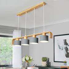 This type of fixture concentrates lights to a island lighting will become the main point of focus of your kitchen and is a staple of many modern kitchen designs. Lukloy Wood Modern Pendant Lights Led Kitchen Lights Led Lamp Hanging Lamp Kitchen Table Bedroom Bar Counter Lighting Fixtures Pendant Lights Aliexpress