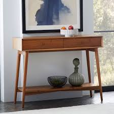 With 3 drawers, these tables provide practical storage space in the living room or dining room. Mid Century Console Acorn