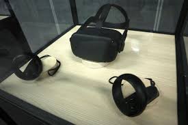 Hands On Oculus Quest Is An Intriguing New Middle Ground For Vr With Images Oculus In Ear Headphones Technology Updates