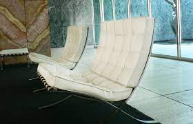 Stainless steel barcelona chair in white leather. 12 Ways The Barcelona Chair Improves Interior Design Lovetoknow