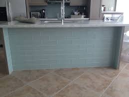 Beachy Kitchen With Lady Onyx Countertops And Glass Tile At Front Of Bar Backsplash Countertops Kitchen Remodel Complete Kitchens