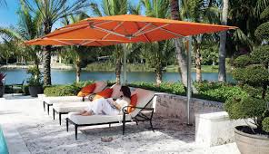 In ground patio umbrella stands and bases are a permanent, secure way to get your umbrellas to stay where you need them. What Is A Cantilever Umbrella Pacific Patio Furniture