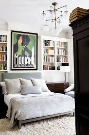 A minimal wall display in which the tv is the main focus of the room and is either surrounded by only a few tiny objects or by nothing at all is a great way to hang your tv on the wall without creating a distracting display. 9 Bedrooms With Endless Bookshelves For Book Lovers