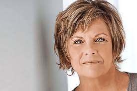 Kim Zimmer, the four-time Daytime Emmy Award winning actor renowned for her  iconic portrayal of Reva Shayne