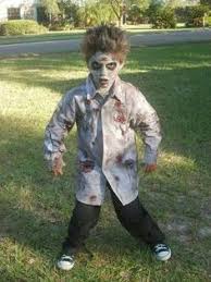 To Make An Easy Zombie Costume Just Put Come Red Paint On A Ripped White Shirt And Add Some D Zombie Costume Kids Zombie Halloween Costumes Zombie Costume Diy