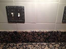 Here's my kitchen before with the backsplash Installing New Backsplash Over Existing Where Granite Meets Old