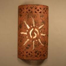 Southwestern sun face outdoor wall sconce, southwestern decor, ceramic sconce, porch light, patio light, exterior lights, dark sky lighting. 24 Best Southwestern Wall Sconces Ideas Southwestern Wall Sconces Wall Sconces Sconces