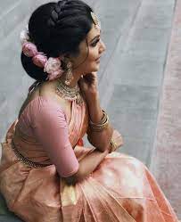 Beautiful South Indian Bride In Pink Indian Bride Hairstyle Saree Hairstyles Bridal Hairstyle Indian Wedding