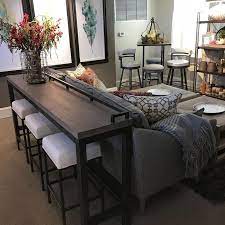 Whether placed behind a sofa or in a compact dining area, the liberty furniture industries morgan creek console table with stools will be a welcome addition to your traditional décor. Console Table And Stools Behind Couch Sofa Table Decor Couches Living Room Dining Room Console