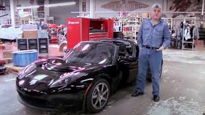 Electric sportscar which delivers a clean conscience, but at a price. Tesla Roadster Was A Giant Leap For Evs Jay Leno S 2008 Drive Reminds Us