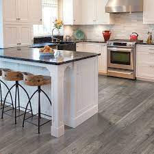 Gray flooring, particularly gray wood, has grown exponentially over the last decade. 43 Amazing Grey Laminate Flooring Kitchen Ornament Decornish Dot Com Grey Laminate Flooring Kitchen Grey Laminate Flooring Laminate Flooring In Kitchen