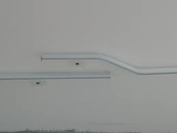 The vidga curtain hanging system makes it easy to hang curtains over windows, on walls, around corners, and even as room dividers around a bed. Ceiling Mounted Curtain Track