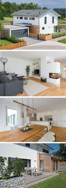 Einfamilienhaus Architektur Im Landhausstil Modern Mit Garage Holz Fassade Satteldach Innen Mit K House Styles Architecture House Modern Architecture House