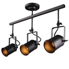 Update Your Home With This Track Style Ceiling Light It Features The Swivel Heads Industrial Ceiling Lights Industrial Track Lighting Track Lighting Fixtures