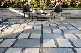 Both stamped concrete and pavers are made with concrete. Breaking It Down Comparing Stamped Concrete Vs Pavers Slabs