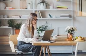 She communicates via the internet. How To Have Great Posture At Your Desk Well Good